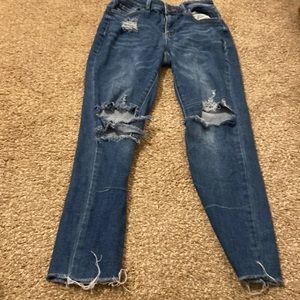 worn dark blue jeans